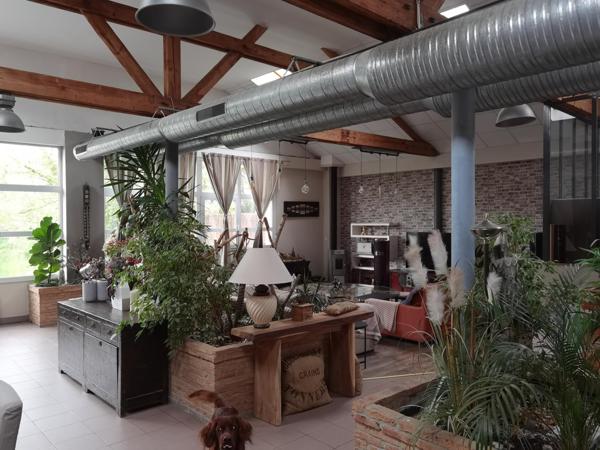 Moulin d'exception au centre d'une ville dynamique