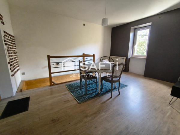Maison avec jardin, terrasse et 2 accès - fort potentiel