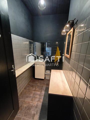 Maison avec jardin, terrasse et 2 accès - fort potentiel
