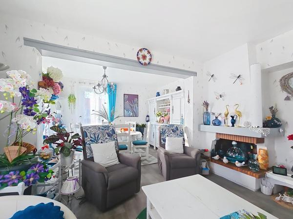 Jolie maison de plain-pied avec jardin