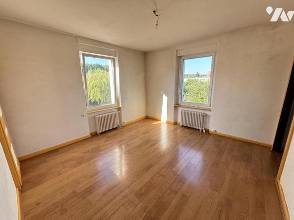 Maison 4 pièces (environ 80 m² habitables), secteur calme proche centre et commodités