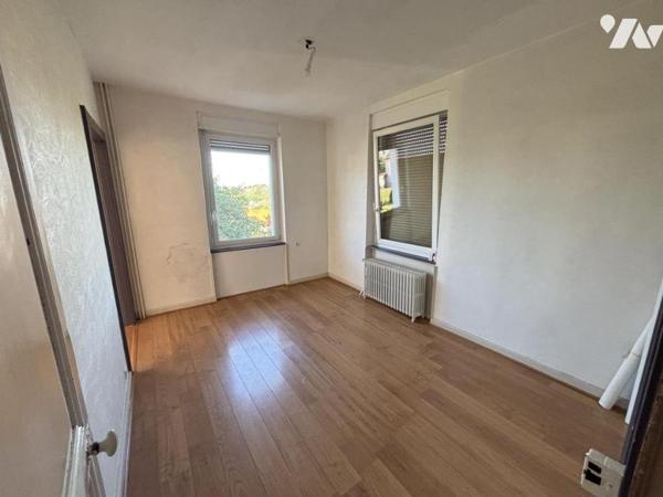 Maison 4 pièces (environ 80 m² habitables), secteur calme proche centre et commodités