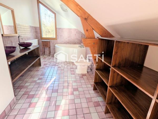 Maison 283 m², 6 chambres, piscine, garage.