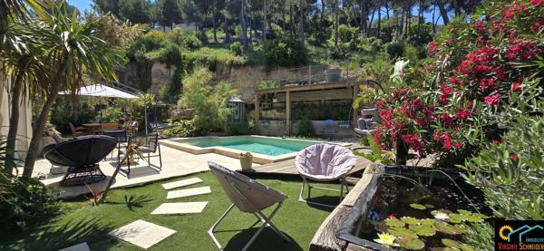 Maison 5 pieces de 130m² sur parcelle de 1260m² avec piscine et garage