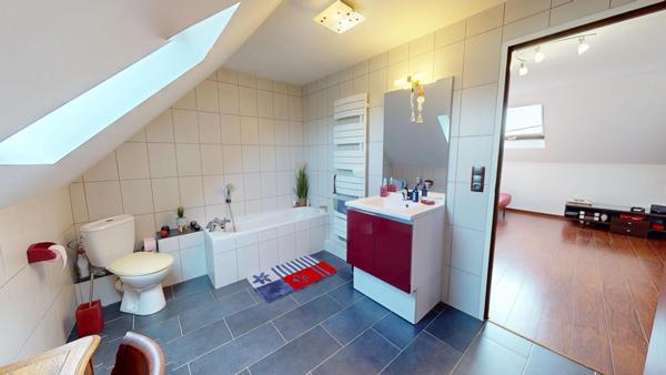 Maison 4 chambres avec grange, sous-sol complet et terrain de 970 m²
