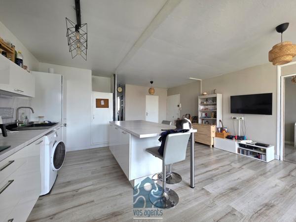 Appartement 4 pièces avec balcon, cave et stationnement
