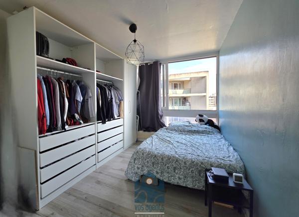 Appartement 4 pièces avec balcon, cave et stationnement