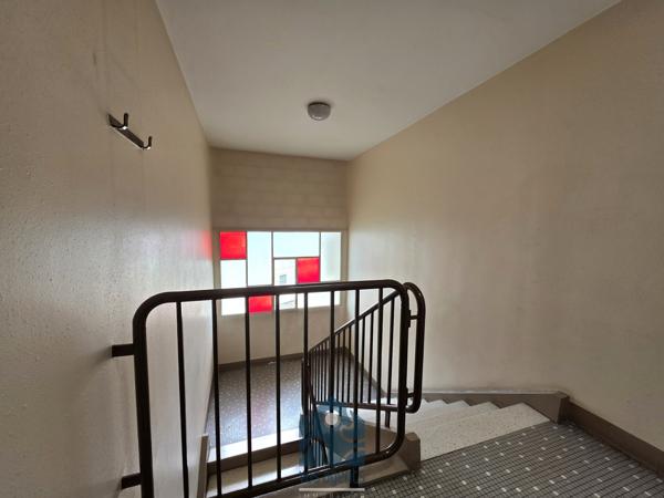 Appartement 4 pièces avec balcon, cave et stationnement
