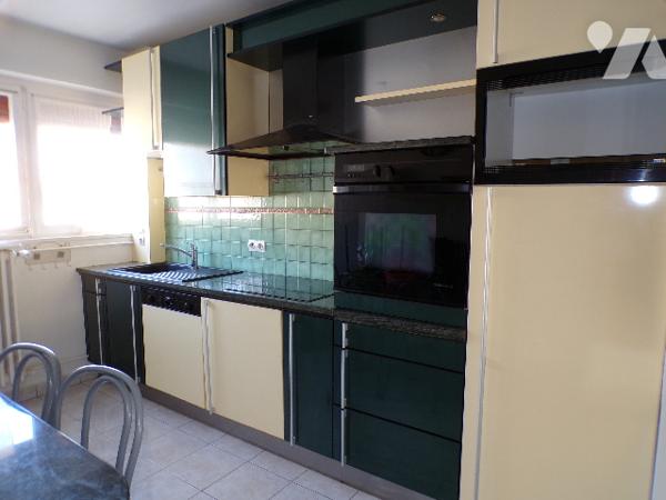 Appartement de type 3 avec balcon et garage