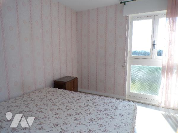 Appartement de type 3 avec balcon et garage