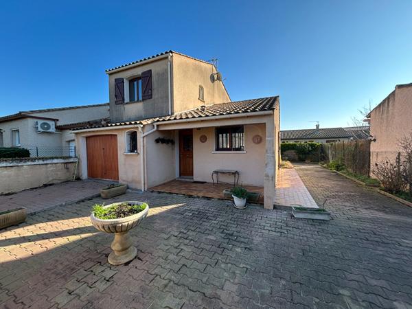 Maison à Carcassonne avec garage et jardin