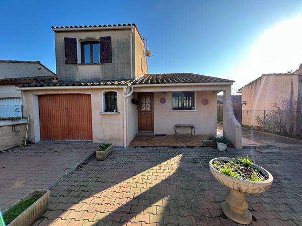 Maison à Carcassonne avec garage et jardin
