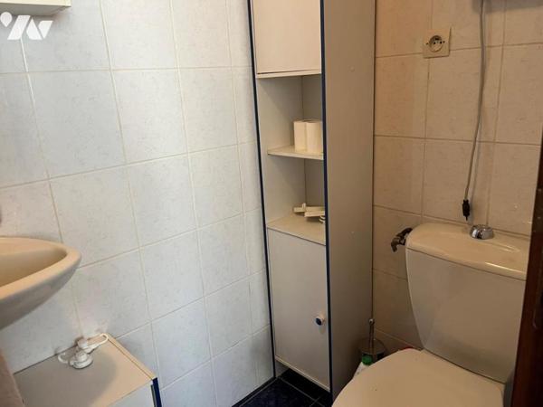 Maison à vendre de type IV/V sur sous-sol; quatre garages et abri  avec une place parking