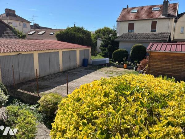 Maison à vendre de type IV/V sur sous-sol; quatre garages et abri  avec une place parking