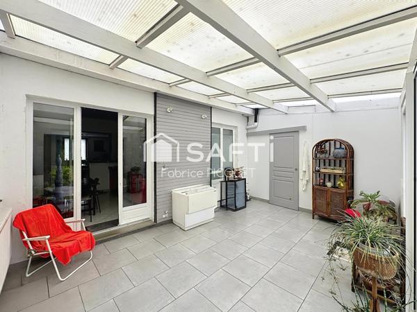 Maison semi individuelle à Raismes– Parcelle de 400 m²- véranda-  4 chambres
