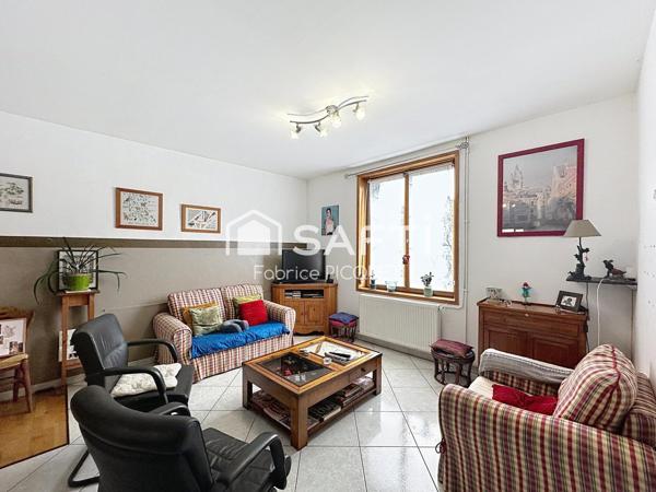 Maison semi individuelle à Raismes– Parcelle de 400 m²- véranda-  4 chambres