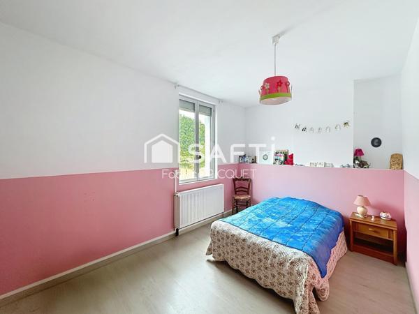 Maison semi individuelle à Raismes– Parcelle de 400 m²- véranda-  4 chambres