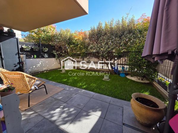 Appartement de 3 pièces avec jardin et 2 places de parking