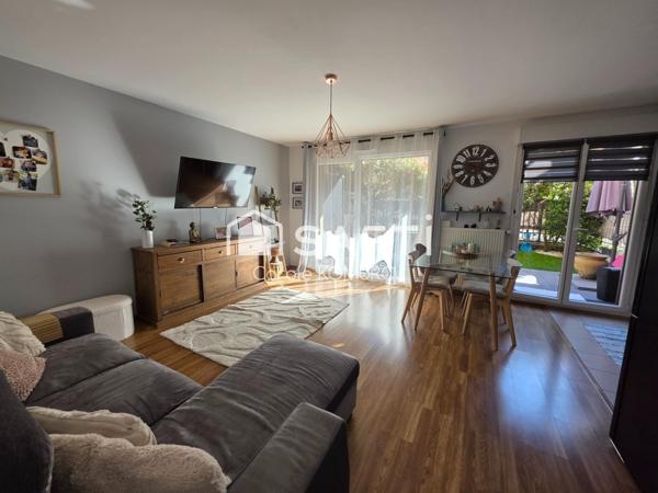 Appartement de 3 pièces avec jardin et 2 places de parking