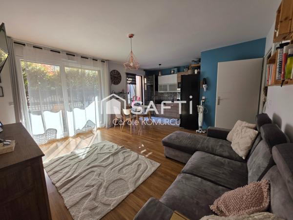 Appartement de 3 pièces avec jardin et 2 places de parking