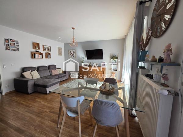 Appartement de 3 pièces avec jardin et 2 places de parking