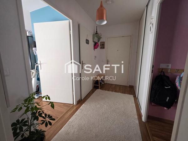 Appartement de 3 pièces avec jardin et 2 places de parking