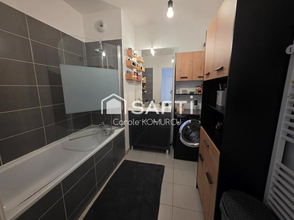 Appartement de 3 pièces avec jardin et 2 places de parking