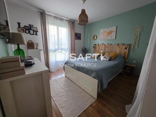 Appartement de 3 pièces avec jardin et 2 places de parking