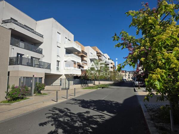 Appartement de 3 pièces avec jardin et 2 places de parking