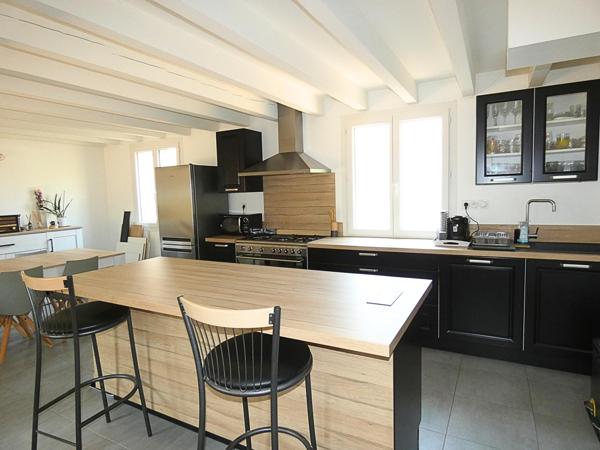 Villa 4 faces de 96m² sur terrain arboré de 627m²