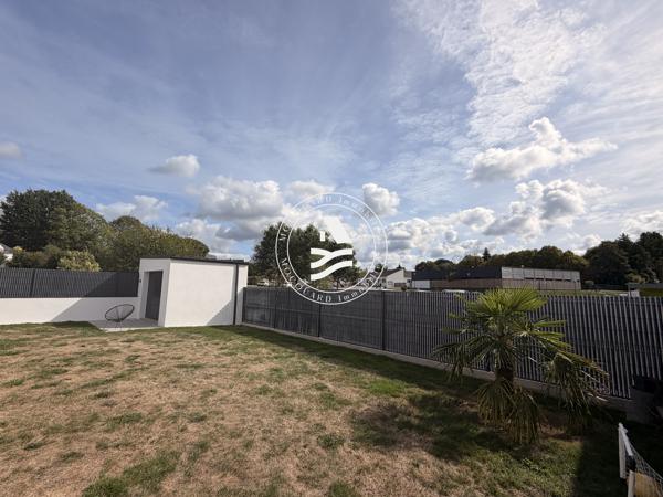 Maison contemporaine de plain pied en centre bourg