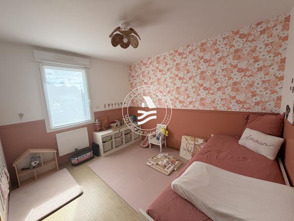 Maison contemporaine de plain pied en centre bourg