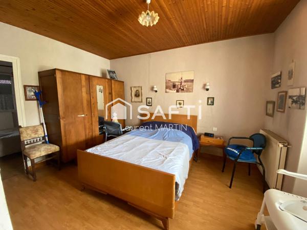 Maison de Centre Ville avec Garage et Jardin