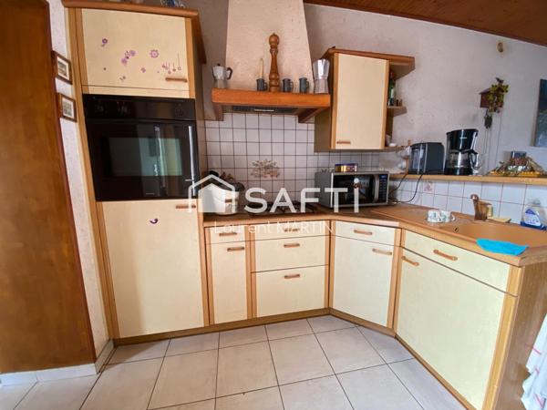 Maison de Centre Ville avec Garage et Jardin