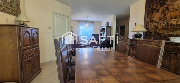 appartement en rez de jardin , avec véranda dans une copropriété securisée à 2 min du centre ville