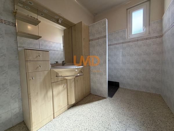 Maison de ville 100 m2 T4 avec cour et garage