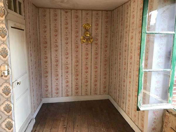 Petite maison à rénover – Au cœur de la ville historique de Bellac