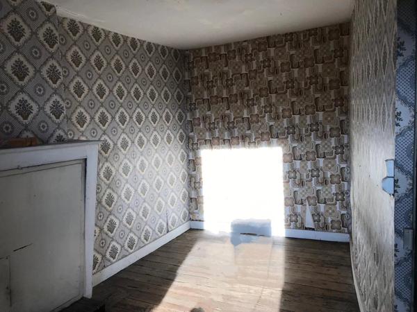 Petite maison à rénover – Au cœur de la ville historique de Bellac