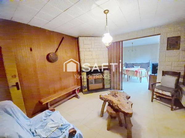 Maison à rénover dans charmant coin de verdure !