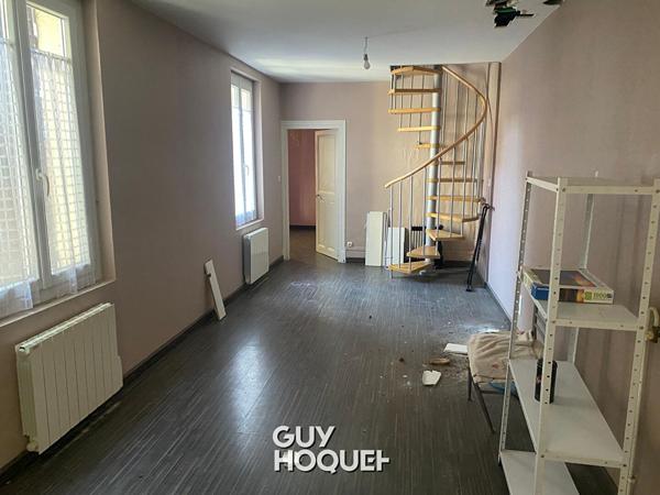 Immeuble de rapport avec commerces et logements - Fort potentiel d'investissement