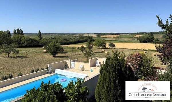 Propriété comprenant une maison principale d'habitation et 3 gites indépendants