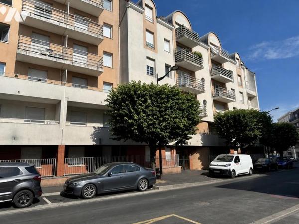 Appartement T3/4 de 70 m² (environ), en centre ville avec une cave et un box en sous-sol sécurisé