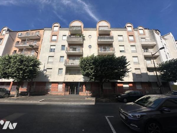 Appartement T3/4 de 70 m² (environ), en centre ville avec une cave et un box en sous-sol sécurisé