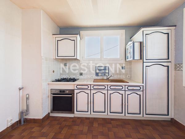 A Saint Paul Des Landes, sur 450 m² de terrain, à vendre maison de type 5 d'une surface de 100 m², avec garage et jardin.