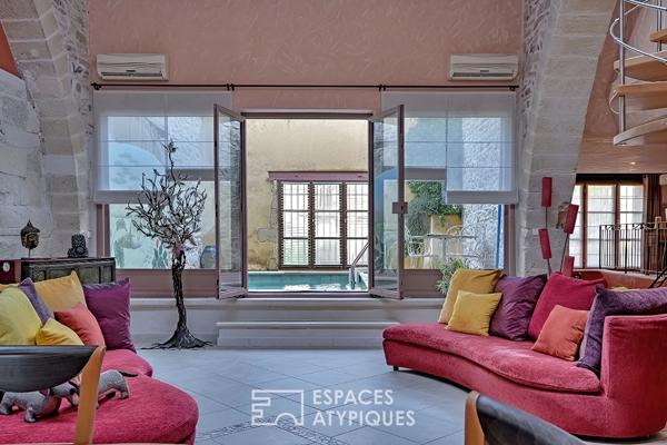 L’élégance d’un ancien chai: Volumes cathédrale et bassin romain