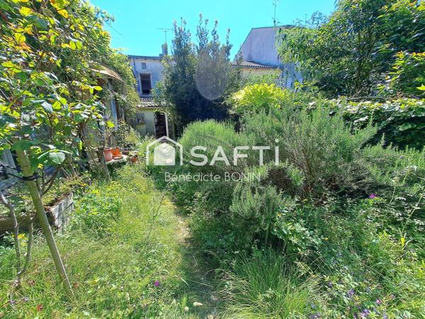 Maison de ville à fort potentiel d'aménagement