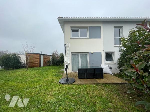 Appartement T3 en duplex avec jardin et 2 places de parking