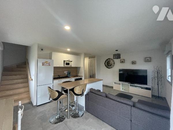 Appartement T3 en duplex avec jardin et 2 places de parking