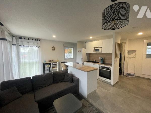 Appartement T3 en duplex avec jardin et 2 places de parking