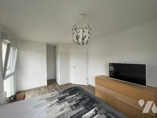 Appartement T3 en duplex avec jardin et 2 places de parking